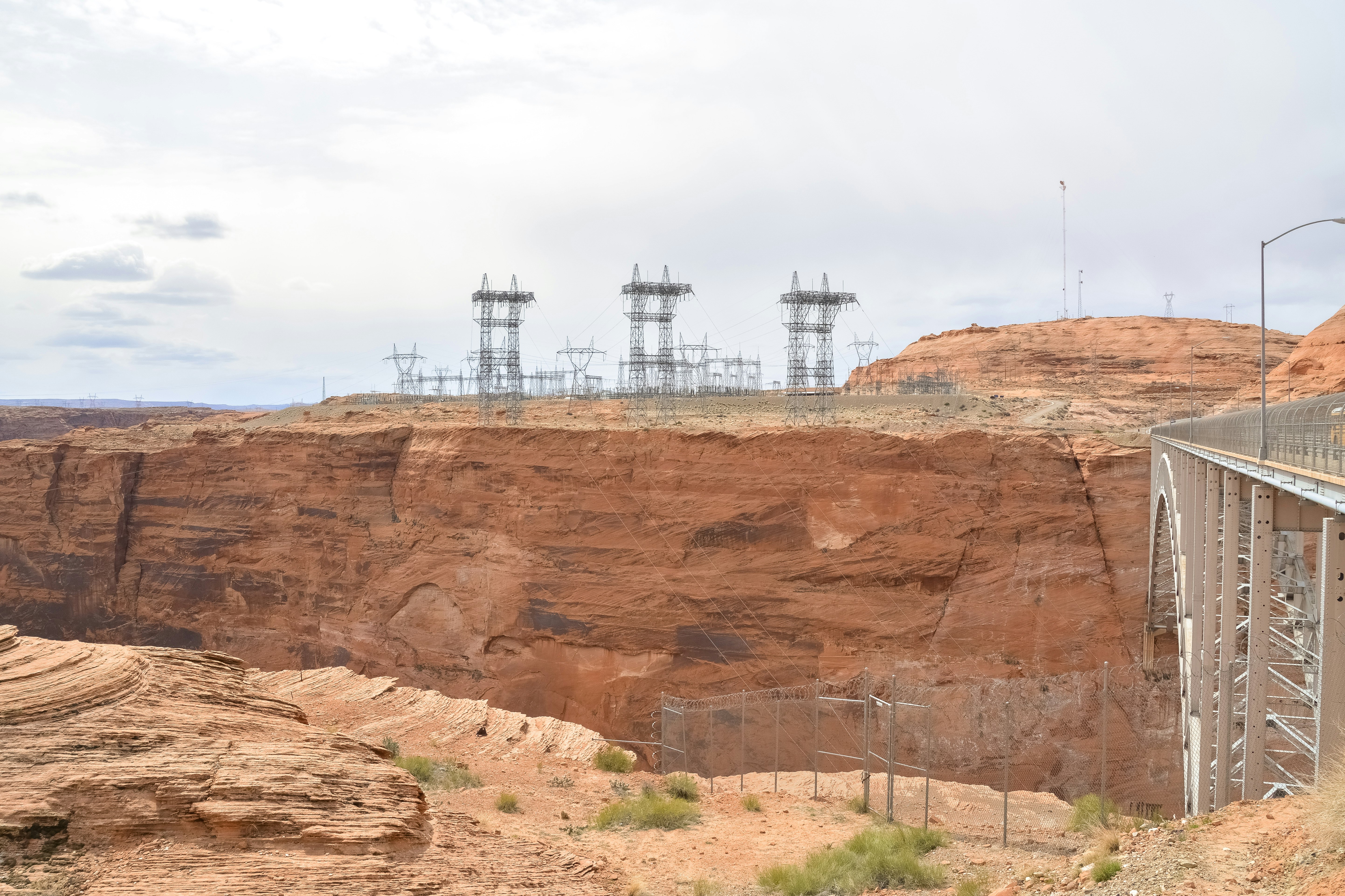 white and brown concrete building on brown rock formation during daytime